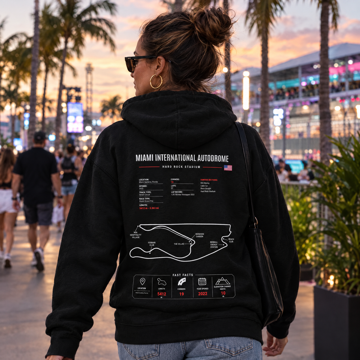 Woman wearing the Allison Racing Miami GP hoodie